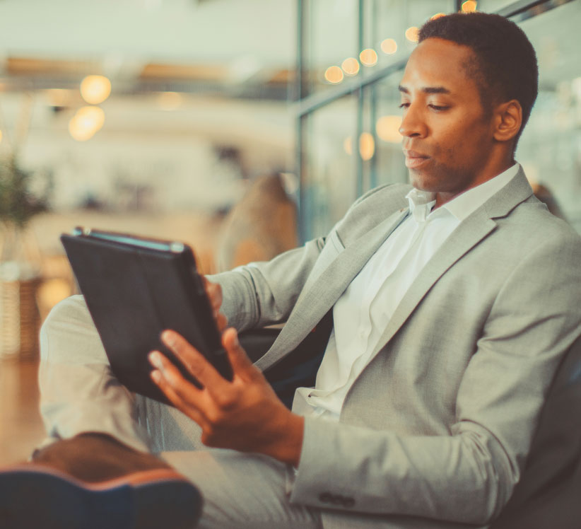 Man reading iPad
